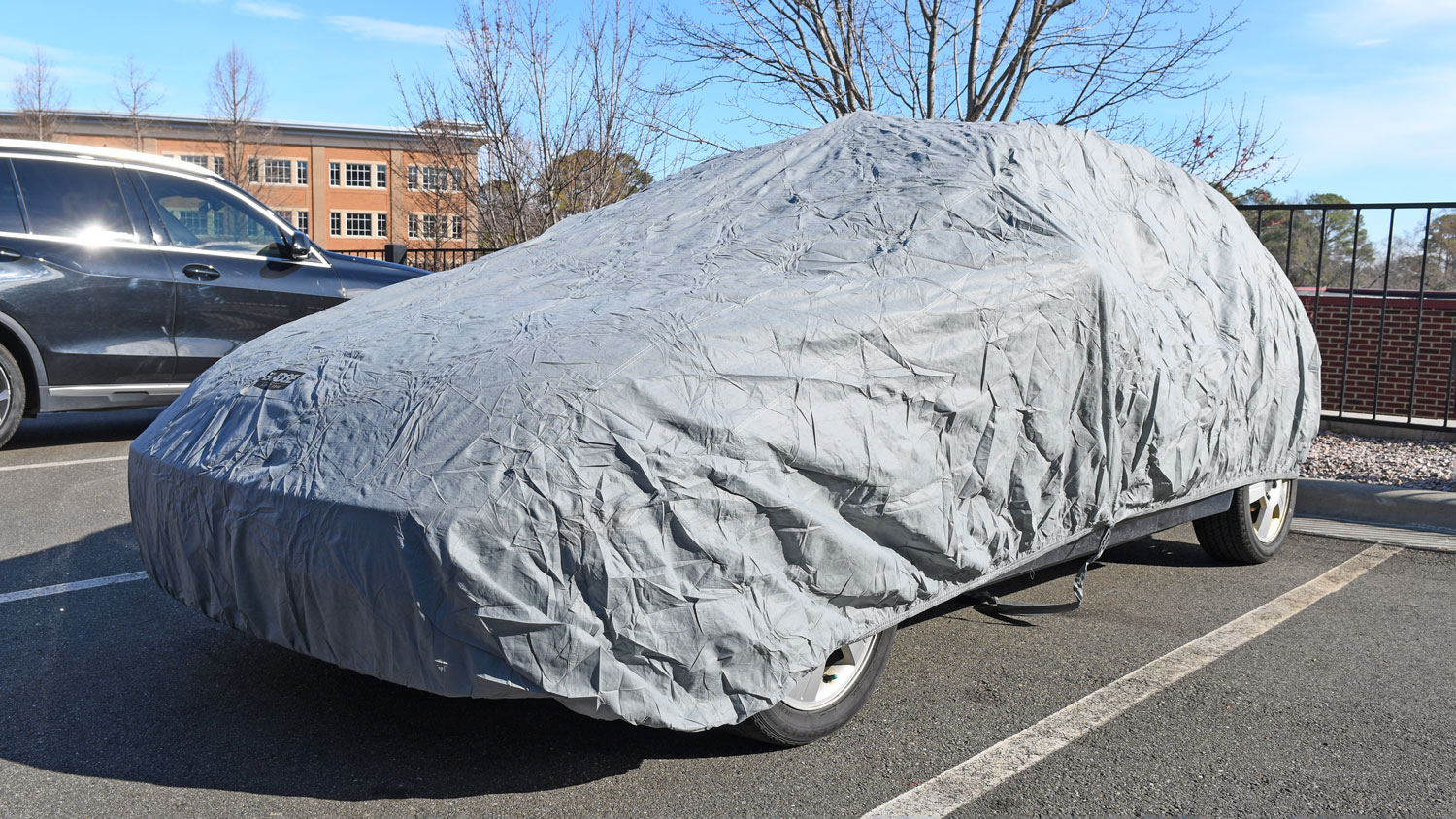 The Budge Lite Car Cover installed on a testing vehicle.