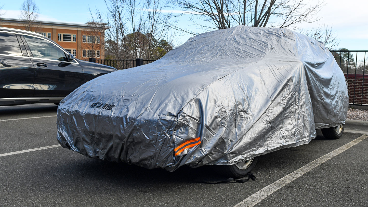 The Motor Trend SafeKeeper Car Cover installed on a testing vehicle.