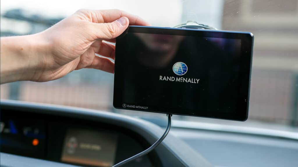 The Rand McNally TND 750 Truck GPS attached to a testing vehicle windshield.